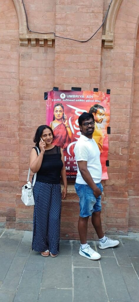 Guests in front of the film poster